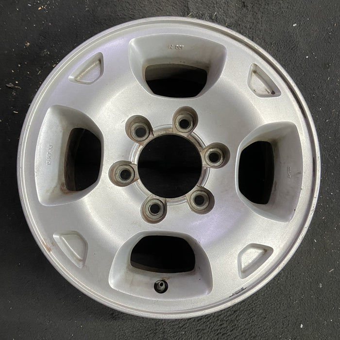 15" XTERRA 00 , alloy, 4 spoke Original OEM Wheel Rim