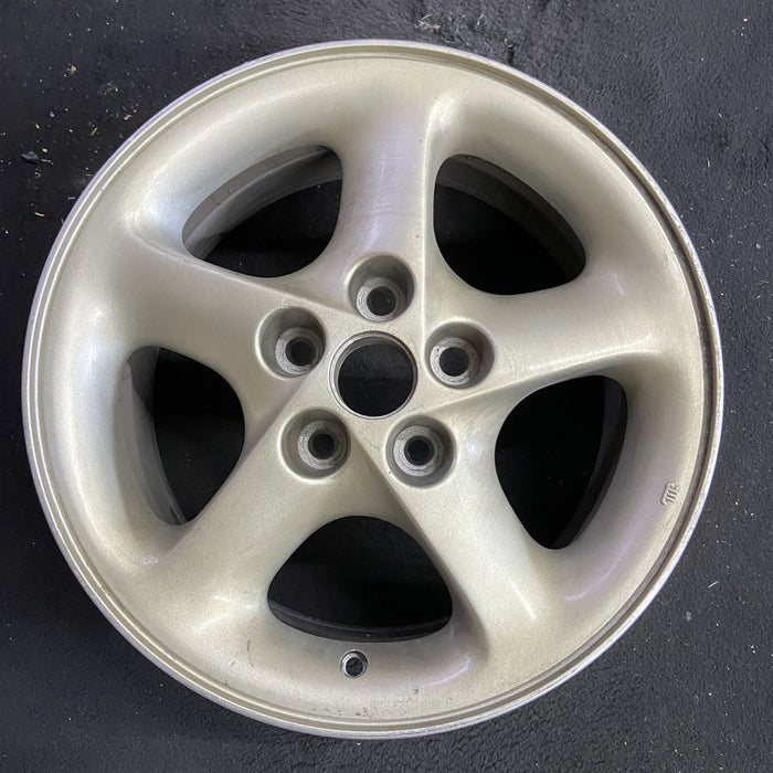 16" PROBE 93-94 16x7, straight spokes, R. Original OEM Wheel Rim - Angle View
