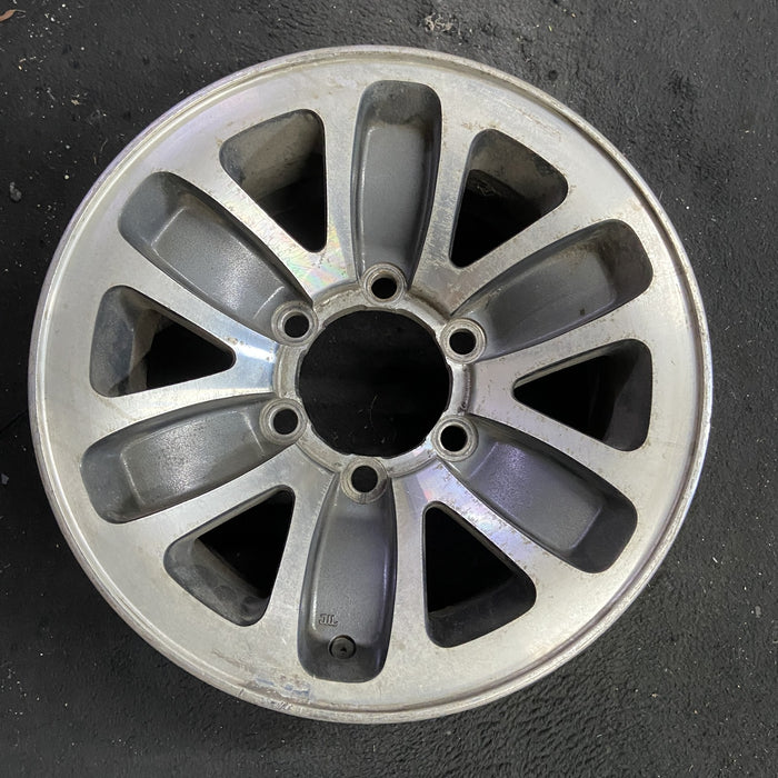 15" MONTERO 92-93 15x7 Original OEM Wheel Rim - Angle View