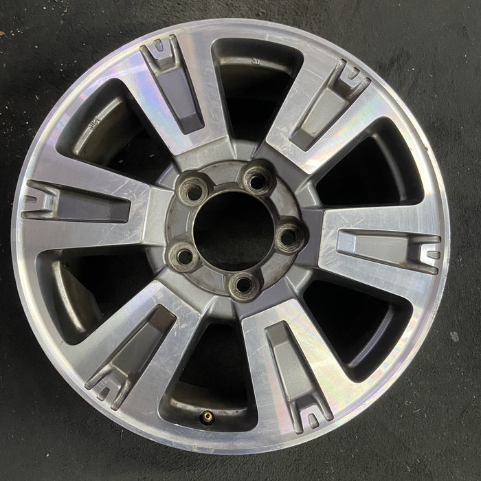 20" TUNDRA 18-21 20x8 , 6 spoke, exposed lug nuts, gray inlay Original OEM - Angle View