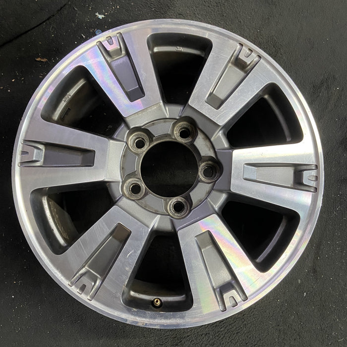 20" TUNDRA 18-21 20x8 , 6 spoke, exposed lug nuts, gray inlay Original OEM - Angle View