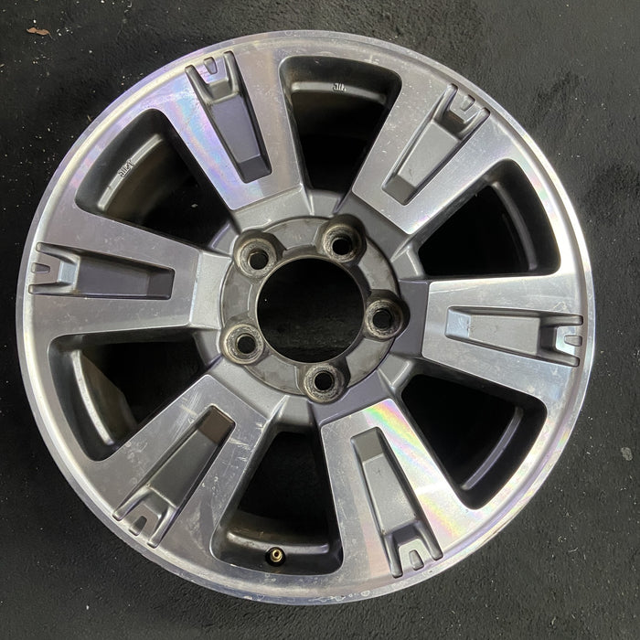 20" TUNDRA 18-21 20x8 , 6 spoke, exposed lug nuts, gray inlay Original OEM - Angle View