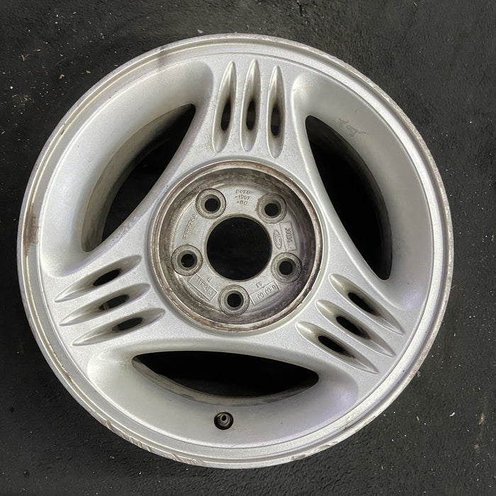 15" MUSTANG 94-95 15x7, w/o exposed lug nuts; w/center cap notch Original OEM - Angle View