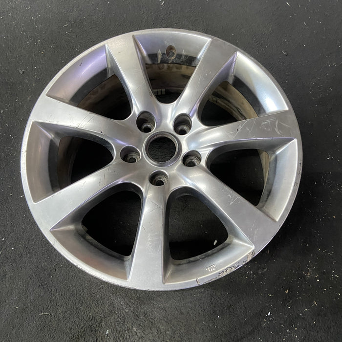 17" INFINITI G35 05-06 17x7 , 7 spoke Original OEM Wheel Rim - Close-Up Detail