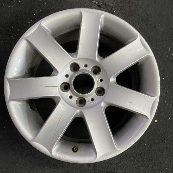 17" BMW 320i 01-05 , 17x8 , 7 spoke, exposed lug nuts, flat spoke Original OEM - Angle View
