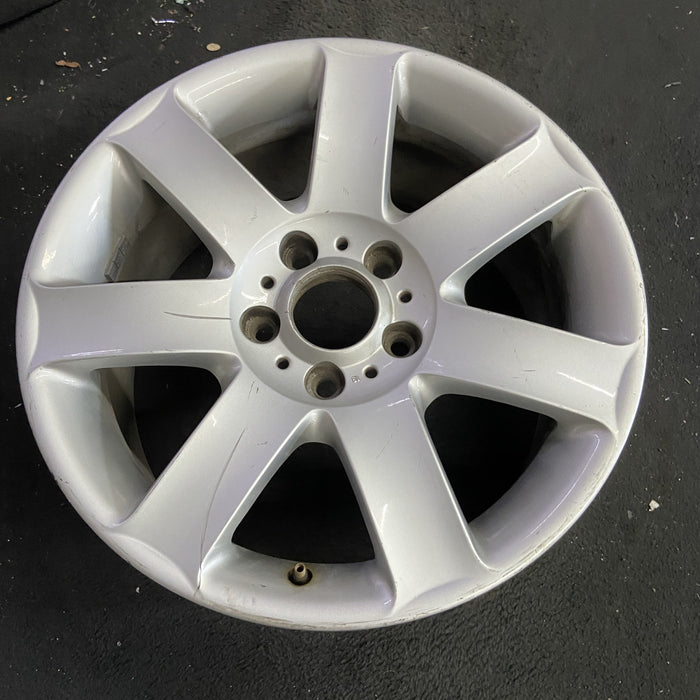 17" BMW 320i 01-05 , 17x8 , 7 spoke, exposed lug nuts, flat spoke Original OEM - Side Profile