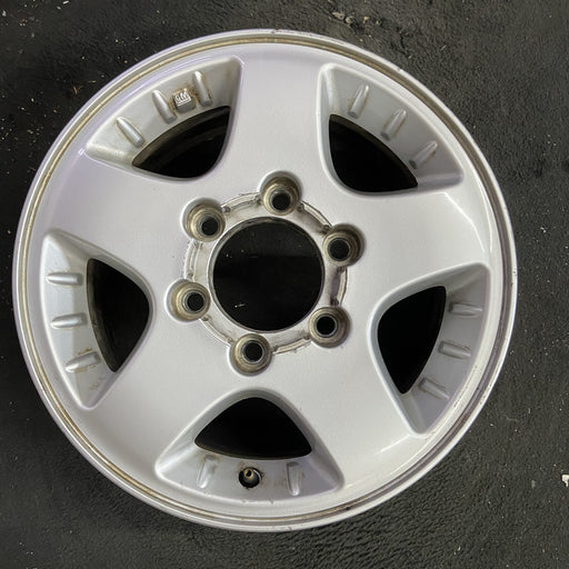 15" CANYON 04-08 15x6.5, 4x4, , smooth spokes Original OEM Wheel Rim - Angle View