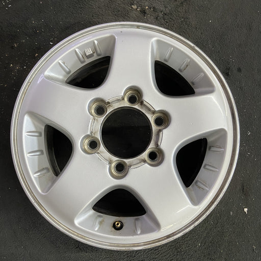 15" CANYON 04-08 15x6.5, 4x4, , smooth spokes Original OEM Wheel Rim - Angle View
