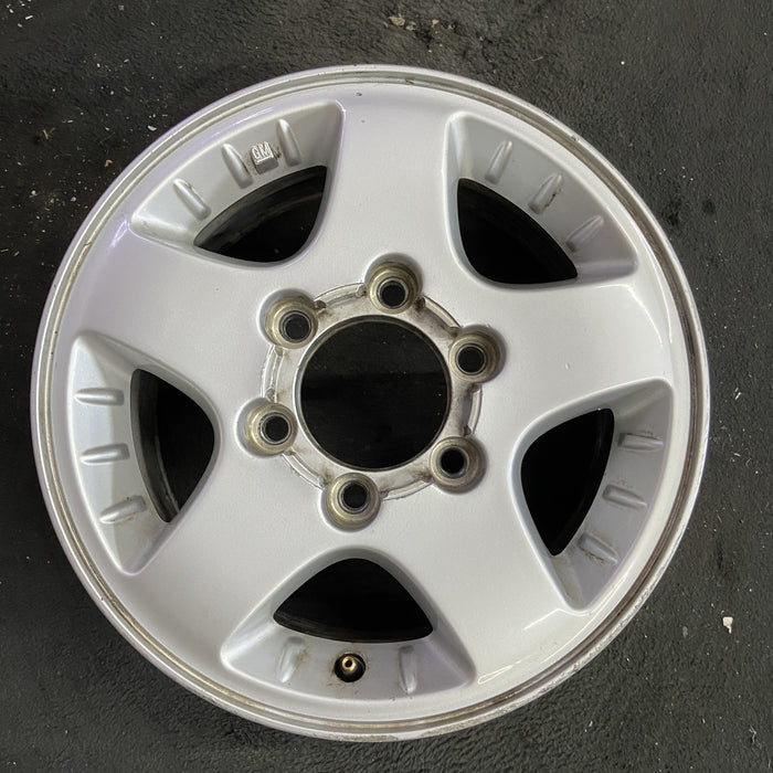 15" CANYON 04-08 15x6.5, 4x4, , smooth spokes Original OEM Wheel Rim - Angle View