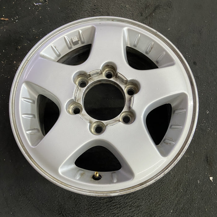 15" CANYON 04-08 15x6.5, 4x4, , smooth spokes Original OEM Wheel Rim - Side Profile