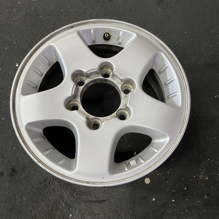 15" CANYON 04-08 15x6.5, 4x4, , smooth spokes Original OEM Wheel Rim - Close-Up Detail