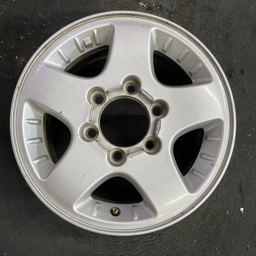 15" CANYON 04-08 15x6.5, 4x4, , smooth spokes Original OEM Wheel Rim - Angle View