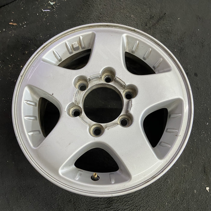15" CANYON 04-08 15x6.5, 4x4, , smooth spokes Original OEM Wheel Rim - Side Profile