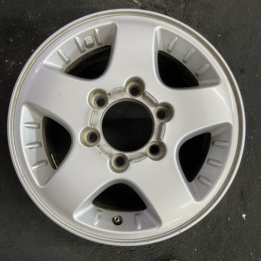 15" CANYON 04-08 15x6.5, 4x4, , smooth spokes Original OEM Wheel Rim - Angle View