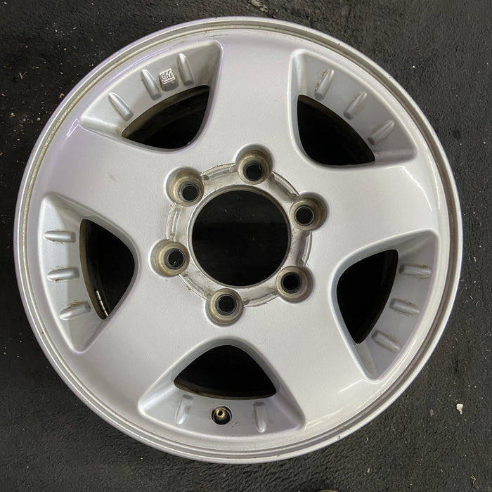 15" CANYON 04-08 15x6.5, 4x4, , smooth spokes Original OEM Wheel Rim - Angle View