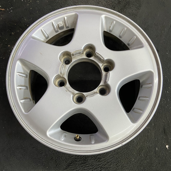 15" CANYON 04-08 15x6.5, 4x4, , smooth spokes Original OEM Wheel Rim - Side Profile