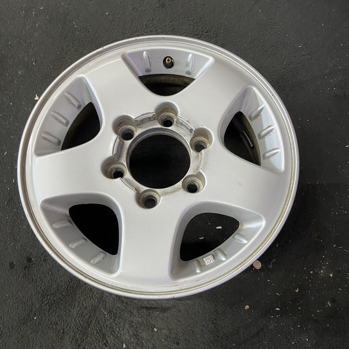 15" CANYON 04-08 15x6.5, 4x4, , smooth spokes Original OEM Wheel Rim - Close-Up Detail