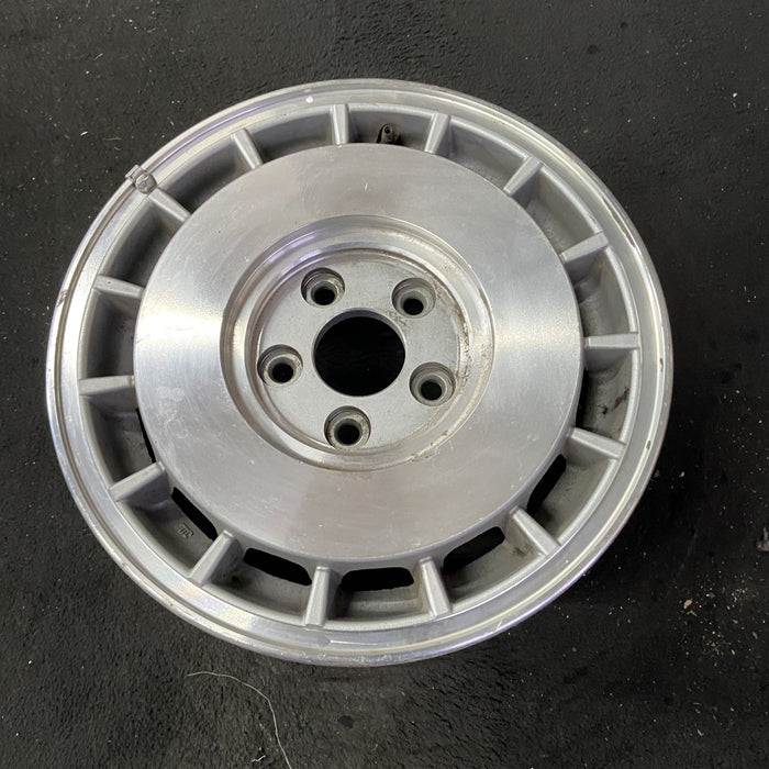 15" INFINITI Q45 92-94 15x6.5 , spoked Original OEM Wheel Rim - Close-Up Detail
