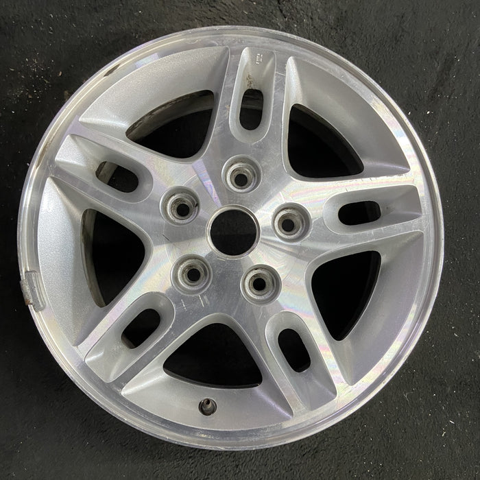 16" GRAND CHEROKEE 99-00 16x7, aluminum, 5 large triangular holes Original OEM Wheel Rim