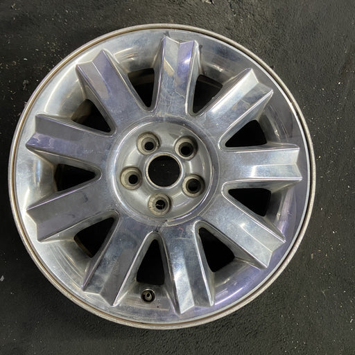 16" SEBRING 04-05 Conv, 16x6.5 , 9 spoke , chrome Original OEM Wheel Rim - Angle View
