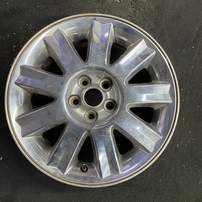 16" SEBRING 04-05 Conv, 16x6.5 , 9 spoke , chrome Original OEM Wheel Rim - Angle View