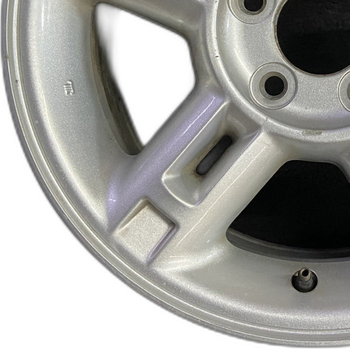 16" EXPLORER 02-03 4 Dr exc. Sport Trac; 16x7 aluminum 5 double spokes w/openings in spokes sparkle silver finish Original OEM Wheel Rim