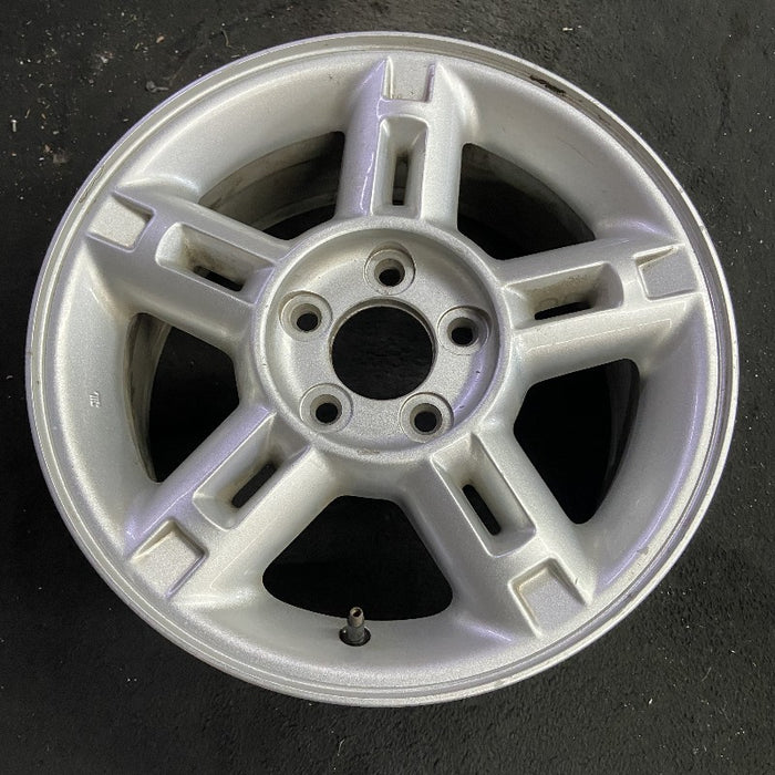 16" EXPLORER 02-03 4 Dr exc. Sport Trac; 16x7 aluminum 5 double spokes w/openings in spokes sparkle silver finish Original OEM Wheel Rim