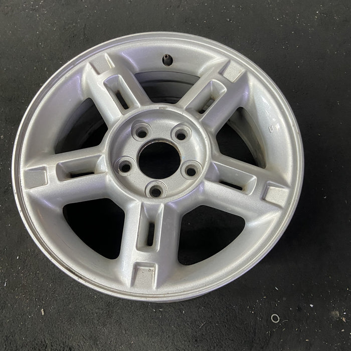 16" EXPLORER 02-03 4 Dr, exc. Sport Trac; 16x7, aluminum, 5 double spokes, w/openings in spokes, sparkle silver finish Original OEM Wheel Rim
