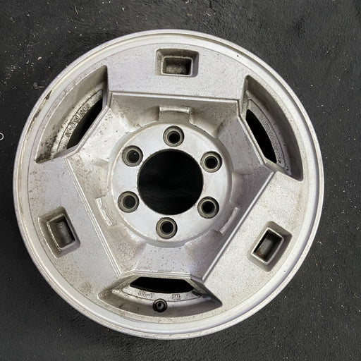 15" NISSAN PICKUP 86 D21, 4x4, 15x7 , front Original OEM Wheel Rim - Angle View