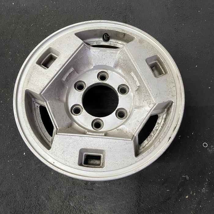 15" NISSAN PICKUP 86 D21, 4x4, 15x7 , front Original OEM Wheel Rim - Close-Up Detail