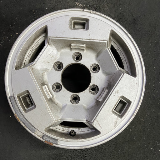 15" NISSAN PICKUP 86 D21, 4x4, 15x7 , front Original OEM Wheel Rim - Angle View