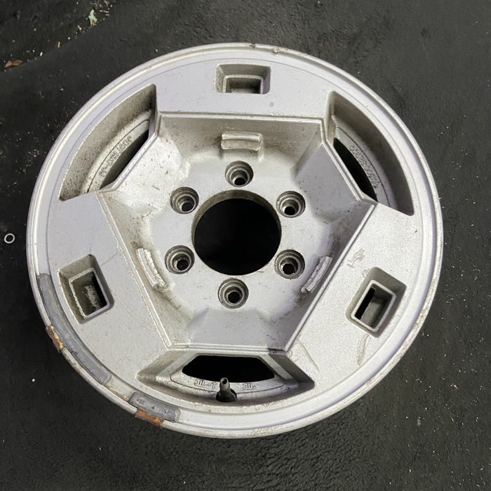 15" NISSAN PICKUP 86 D21, 4x4, 15x7 , front Original OEM Wheel Rim - Side Profile