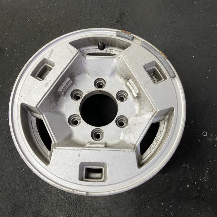 15" NISSAN PICKUP 86 D21, 4x4, 15x7 , front Original OEM Wheel Rim - Close-Up Detail