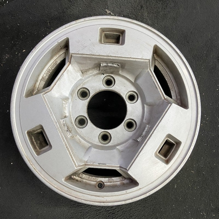 15" NISSAN PICKUP 86 D21 4x4 15x7 alloy frt Original OEM Wheel Rim - Front View