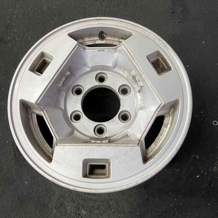 15" NISSAN PICKUP 86 D21, 4x4, 15x7 , front Original OEM Wheel Rim - Close-Up Detail