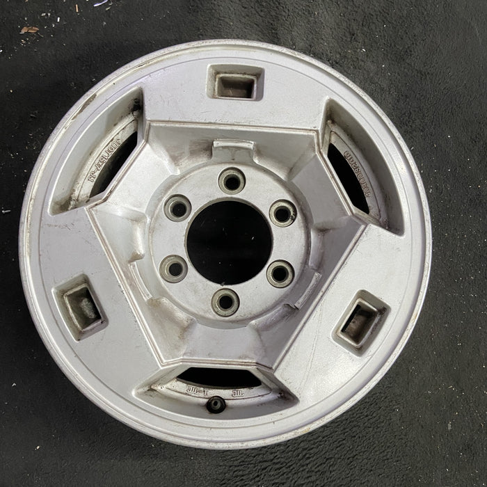 15" NISSAN PICKUP 86 D21, 4x4, 15x7 , front Original OEM Wheel Rim - Angle View