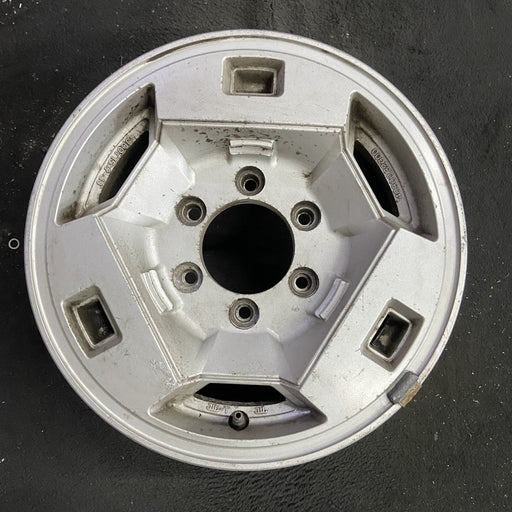 15" NISSAN PICKUP 86 D21, 4x4, 15x7 , front Original OEM Wheel Rim - Angle View