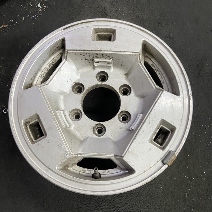 15" NISSAN PICKUP 86 D21, 4x4, 15x7 , front Original OEM Wheel Rim - Side Profile