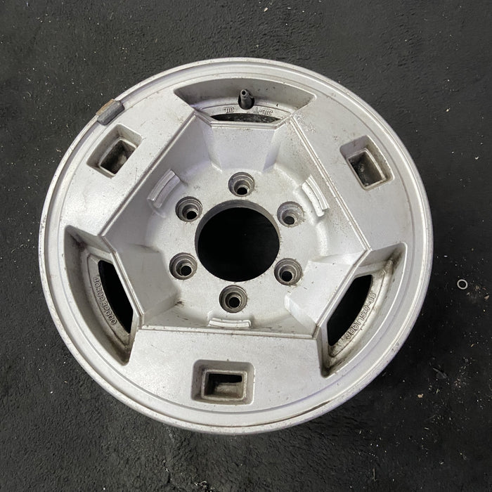 15" NISSAN PICKUP 86 D21, 4x4, 15x7 , front Original OEM Wheel Rim - Close-Up Detail