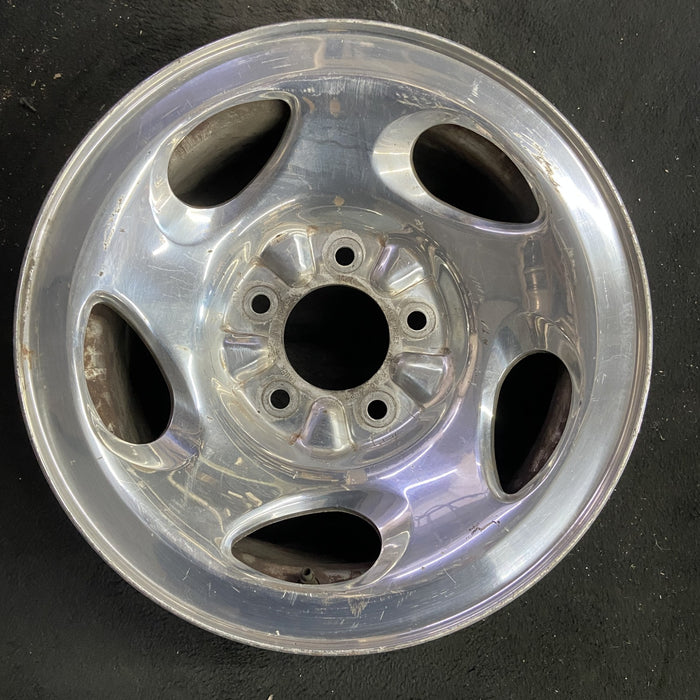 16" FORD F150 PICKUP 00 12mm lugs , 16x7, aluminum, 5 ovals spokes Original OEM - Angle View