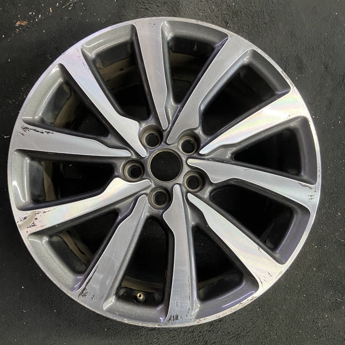 18" MKC 19 18x8 , 10 spoke, machined face with pockets Original OEM Wheel Rim - Angle View