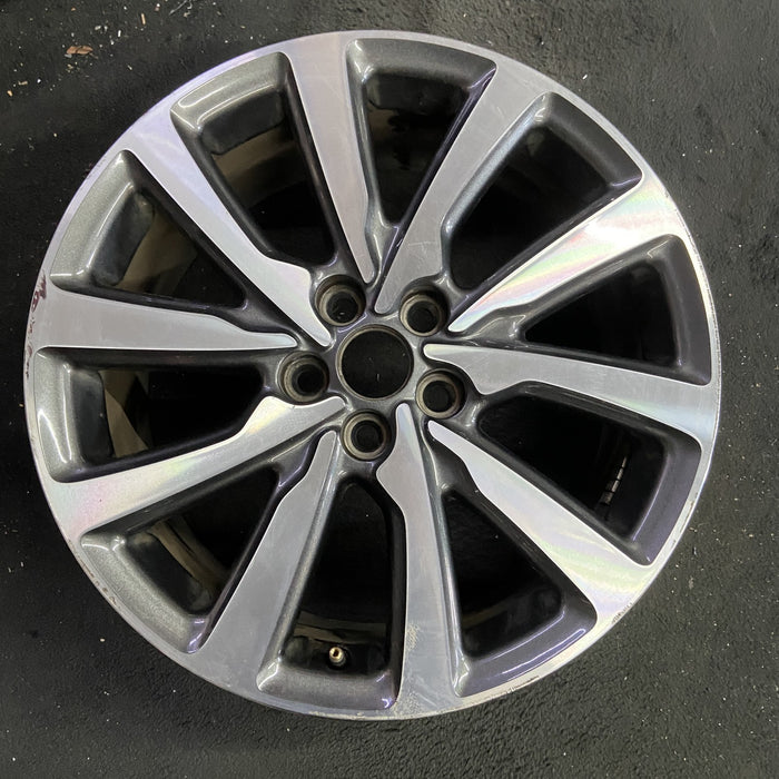 18" MKC 19 18x8 , 10 spoke, machined face with pockets Original OEM Wheel Rim - Angle View