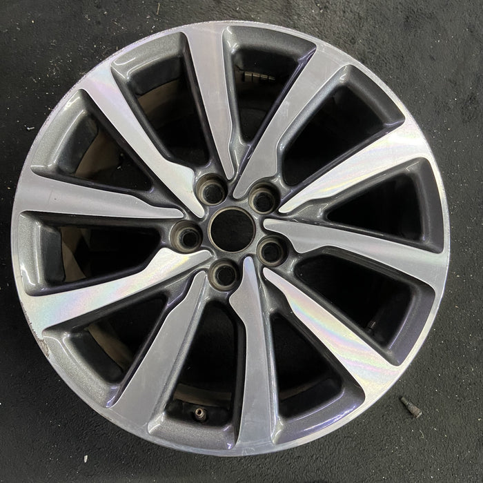 18" MKC 19 18x8 , 10 spoke, machined face with pockets Original OEM Wheel Rim - Angle View