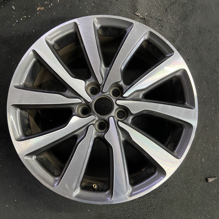 18" MKC 19 18x8 , 10 spoke, machined face with pockets Original OEM Wheel Rim - Angle View