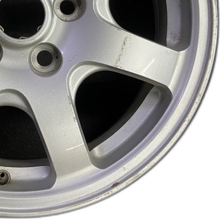 16" DIAMANTE 97-99 16x6 aluminum 7 spoke silver Original OEM Wheel Rim - Close-Up Detail