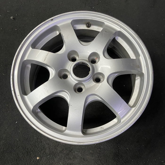 16" DIAMANTE 97-99 16x6, aluminum, 7 spoke, silver Original OEM Wheel Rim - Close-Up Detail