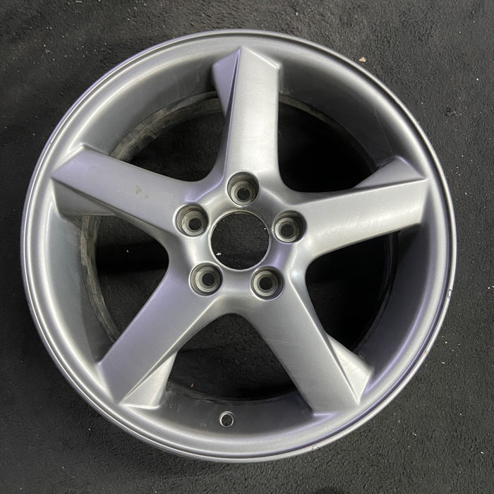 15" VOLVO 70 SERIES 00 15x6.5, Sdn, alloy, 5 spoke, twisted spokes Original OEM - Angle View