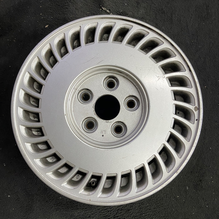 15" MAZDA 929 90-91 15x6 , 30 slot, L. Original OEM Wheel Rim - Angle View