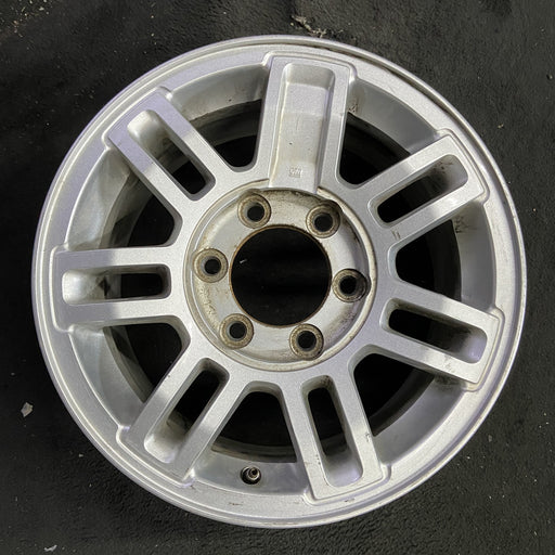 16" HUMMER H3 08 16x7.5, 7 double spoke, finish Original OEM Wheel Rim - Angle View