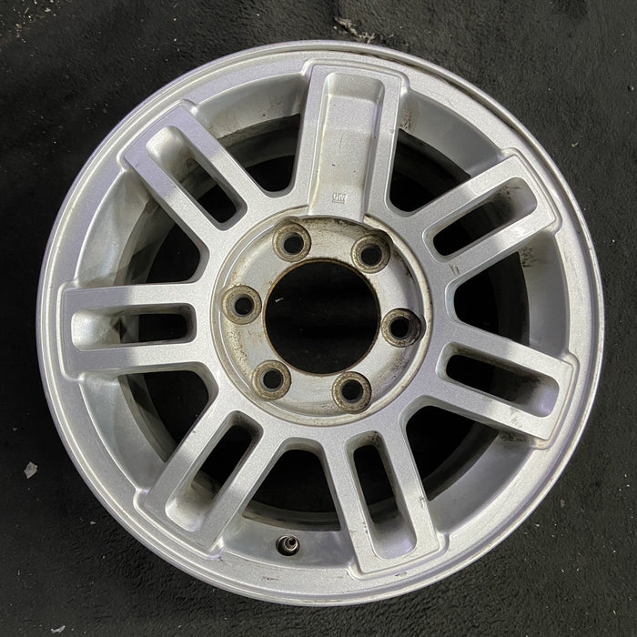 16" HUMMER H3 08 16x7.5, 7 double spoke, finish Original OEM Wheel Rim - Angle View